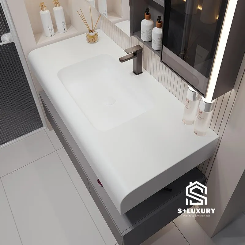 Cận cảnh mặt chậu lavabo bo tròn liền khối tráng men tuyết Nano nung nhiệt độ cao chống bám cặn vôi Cận cảnh mặt chậu lavabo bo tròn liền khối tráng men tuyết Nano nung nhiệt độ cao chống bám cặn vôi